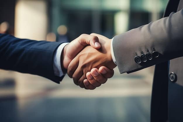 Business professionals shaking hands
